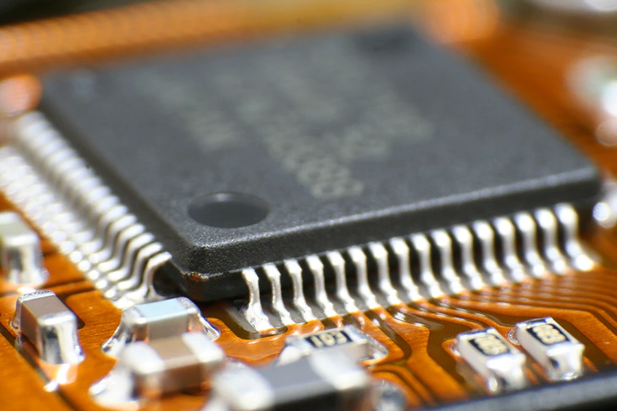 photo of computer chip mounted to a circuit board